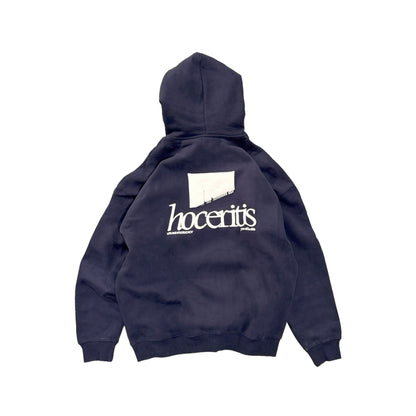 Navy blue hoodie with 'hoceritis' logo on the back against a white background